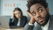 © Ishika - bored Employee Looks Away from Boring Meeting