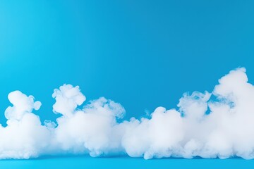 Poster - A serene blue background features fluffy white clouds, creating a calm and dreamy atmosphere.