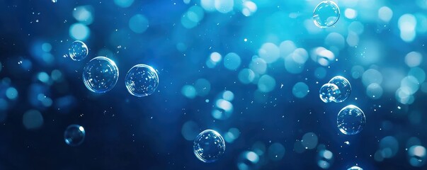 Poster - A serene underwater scene featuring bubbles and shimmering blue tones, evoking a tranquil and calming atmosphere.