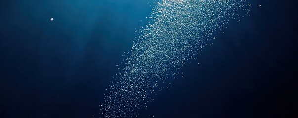 Poster - A serene underwater scene depicting bubbles rising through dark blue water, capturing a sense of tranquility and depth.
