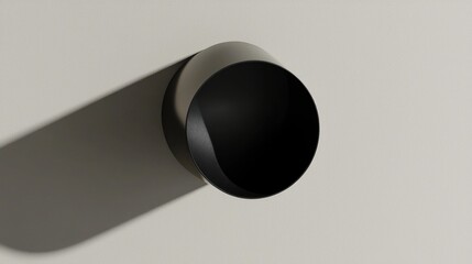 Poster - Modern wall lamp casting a shadow on a textured wall in a minimalist interior design concept with soft lighting and neutral tones