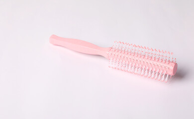 Wall Mural - Hairdresser tool. Round pink brush on white background