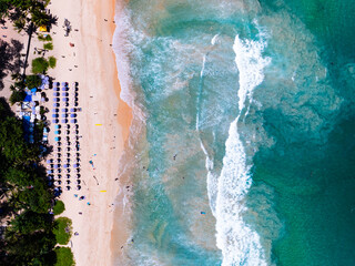 Wall Mural - Summer seascape beautiful waves,Tropical sea water in sunny day, Top view from drone camera,Amazing ocean colorful nature background, Beautiful bright sea waves splashing on beach sand