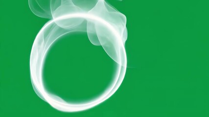 Poster - White smoke gradually forming perfect ring shape against vibrant green screen background, demonstrating mesmerizing visual transformation with fluid, ethereal vapor movement