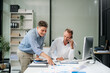 © laddawan - Portrait of success business people working together in modern office.