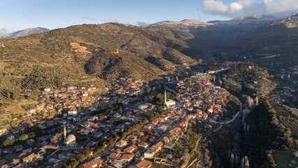 Wall Mural - Architecture stone buildings, traditional Turkish village houses in touristic place Birgi, Izmir. Landscape with aerial drone.