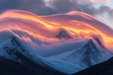 Poster - Stunning timelapse captures sunset and clouds enveloping majestic mountain peaks, Time-lapse of sunset and clouds flowing on top of mountains