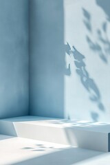 Poster - Circular White Pedestal Casting Shadows on a Blue Wall With Green Foliage in a Serene and Minimalist Interior Setting