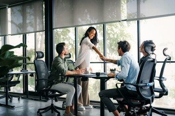 Meeting, partnership and business people shaking hands in the office for a deal, collaboration