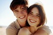 © BonzEarthsnapper - Joyful young couple embracing and smiling at the beach during sunset, capturing carefree moments of love and happiness in a warm natural setting