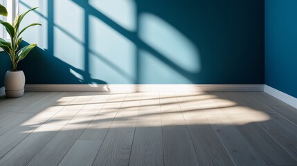 Poster - Shadows and Light Create Artistic Patterns on a Blue Wall With Plant Leaves in a Cozy Interior Space