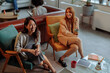 © bernardbodo - Business colleagues drinking coffee and talking