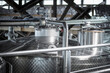 © fStop - Shiny stainless steel winemaking tank