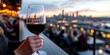 © Budsadee - A curvy woman enjoying a glass of wine at a rooftop bar, city skyline in the background, classy and elegant