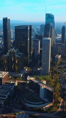 Wall Mural - Aerial view of american city with skyscrapers. Urban building landscapes. Vertical video