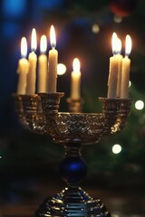 Poster - A group of lit candles sitting on a table, ideal for decorating events or creating ambiance