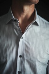 Poster - A close-up shot of a man wearing a shirt and tie, suitable for corporate or professional use