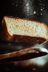 Poster - A piece of bread falls off a spoon, useful for scenes with food, mess or humor