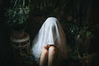 © ADDICTIVE STOCK - Mysterious Figure with Veil Among Indoor Plants