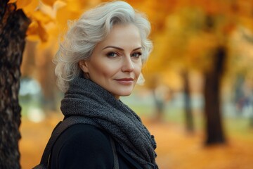 Aufkleber - A woman stands in front of a tree in a peaceful park setting