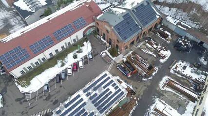 Canvas Print - Aerial view industrial buildings with solar panels