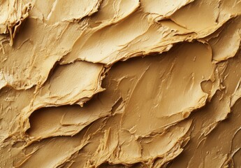 Poster - Textured Golden Surface with Waves and Peaks Ideal for Backgrounds, Illustrations, and Design Projects Featuring Organic Patterns and Subtle Highlights