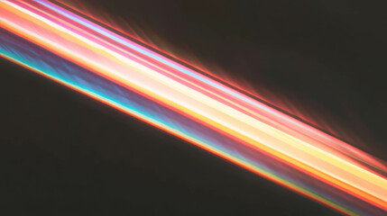 Poster - Vivid diagonal rainbow light beam on dark background for creative design