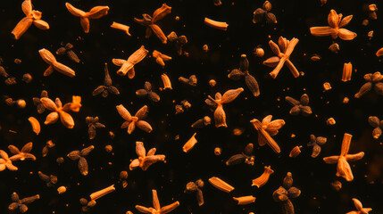 Poster - Aromatic background of falling dark brown cloves for culinary and spices theme