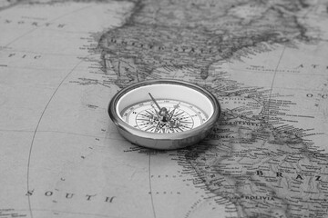Wall Mural - classic round compass on background of old vintage map