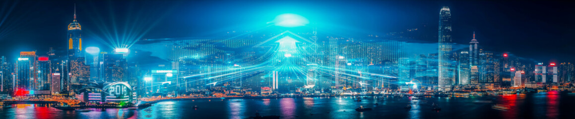 Fototapete - A vibrant night skyline in Hong Kong, a concept representing business growth and growing up in a dynamic, illuminated city.
