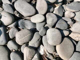 Smooth river stones, perfect for background, landscape, or Zen garden design,Large pebbles