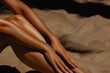 © Mirrorstudio - Female young skin sunbathing on beach sand with warm sunlight and relaxation. Skin care, sun protection