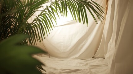 Poster - Softly Lit Studio Space With Draped Fabric and Lush Greenery Inviting Creativity and Calmness