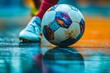 © Nure - Close-Up of Player Kicking the Ball on an Indoor Court with Motion Blur