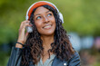 © carballo - portrait of beautiful young latina woman with headphones