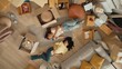 © InfiniteFlow - Lesbian lover looking at phone while laughing together and lying down at living room floor with cardboard box scattering. Happy couple checking at smart phone while spending time together. Myrmidon.