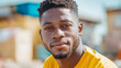© Michael - Confident African American male wearing bright yellow tee, displaying contemporary urban fashion with self-assured expression