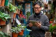 © Vera - Asian man working on construction site with digital tablet and BIM technology.