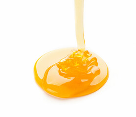 Leinwandbilder - Pouring golden honey isolated on a white background, cutout