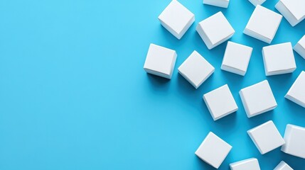 Poster - a collection of white cubes scattered on a vibrant blue background, ideal for design use