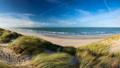 north sea beach with dunes and ocean panorama view