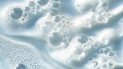 Poster - Sudsy white and pale blue foam creating textural background representing cleanliness, hygiene, and skincare product visualization