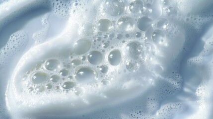 Poster - Frothy soap bubbles swirling in clear water, representing cleaning process, detergent effectiveness, and fresh laundry with delicate, iridescent surface tension