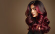 © edwardderule - Beautiful Indian Woman with burgundy balayage , hair coloring technique. Beauty model girl with medium length soft wavy hair . curly hairstyle dye .Fashion, cosmetics and makeup