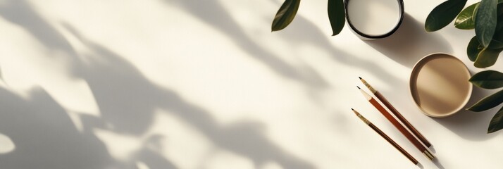 Leinwandbilder - Creative workspace with natural elements and art supplies on a light surface during the afternoon. Generative AI