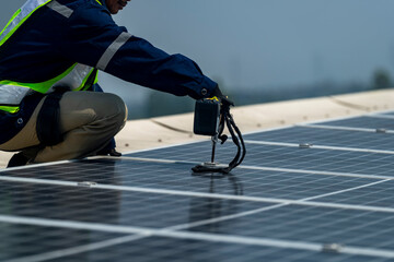 Wall Mural - team of professionals installs solar panels, ensuring energy efficiency and sustainable development.