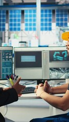 Poster - vertical video photovoltaics factory worker discussing with woman about system performance. solar pa