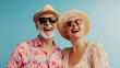 © Lucianastudio - Cheerful senior couple radiating joy during their vacation, captured in a bright and vibrant portrait