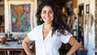 © Ari - Portrait of a Smiling Female Artist in Her Vibrant Studio