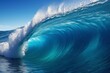 © haiqiang - arafed wave breaking in the ocean with a blue sky